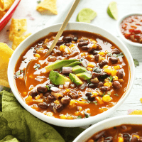 Bowls of Chipotle Black Bean Tortilla Soup for our 12 Comforting Vegan Soups roundup