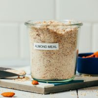 Jar of homemade almond meal made with our How to Make Almond Meal tutorial