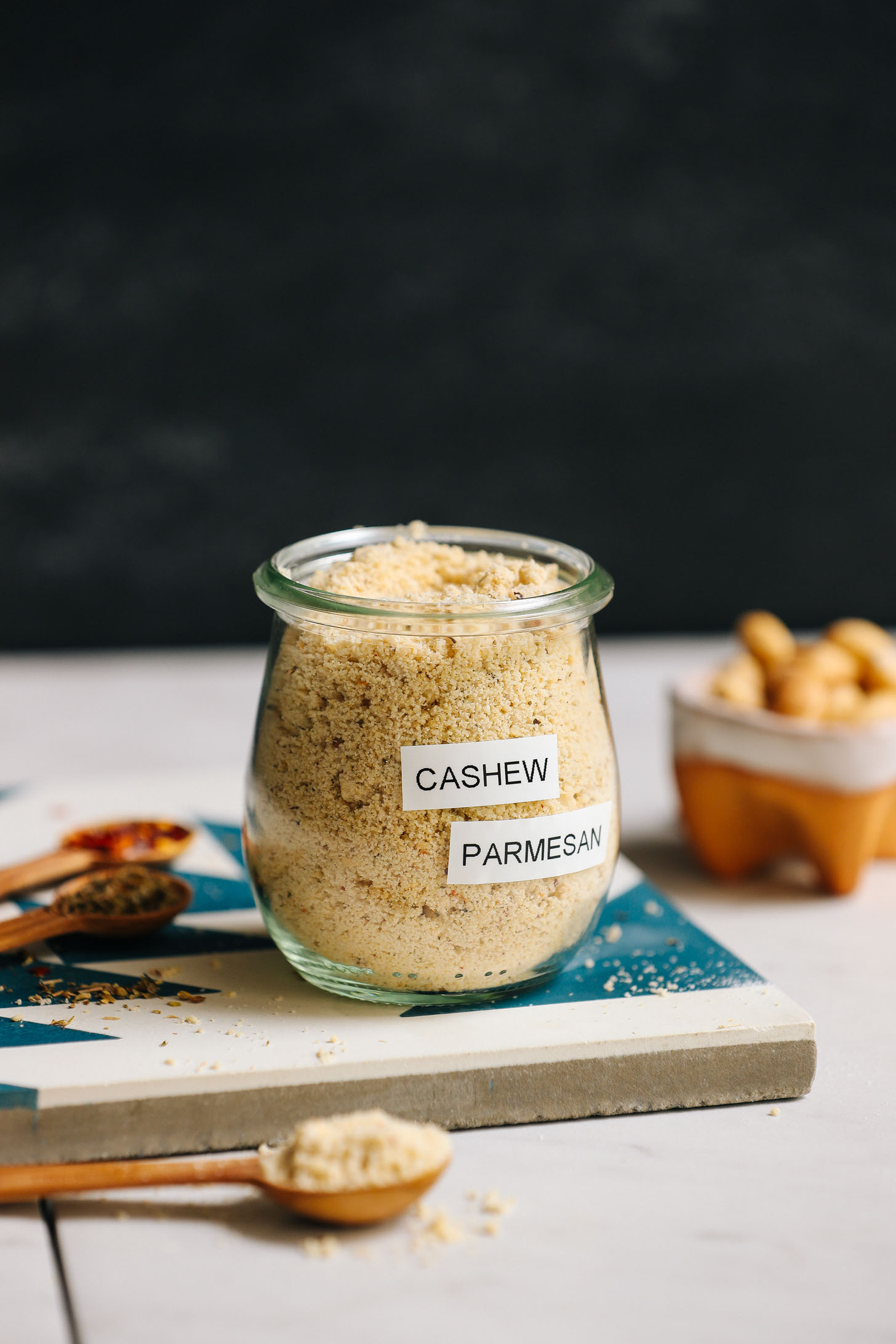Jar of our Cashew Parmesan Cheese for our Guide to Vegan Cheeses