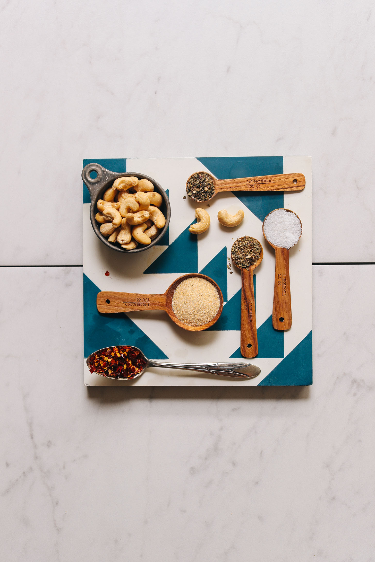 Tile with ingredients for making yeast-free Vegan Cashew Parmesan cheese