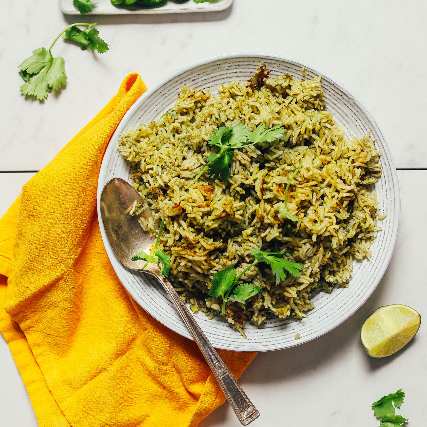 Big bowl of Mexican-inspired Green Rice topped with fresh cilantro