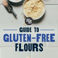 Bowls and jar of gluten-free flours for our guide to using gluten-free flours
