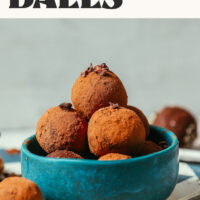 Bowl of homemade Brownie Bliss Balls made from almond pulp