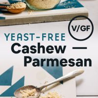 Jar and spoonful of Vegan Cashew Parmesan made without yeast