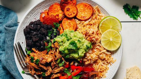 Grain-Free Burrito Bowl made with cauliflower rice, peppers, black beans, and sweet potatoes