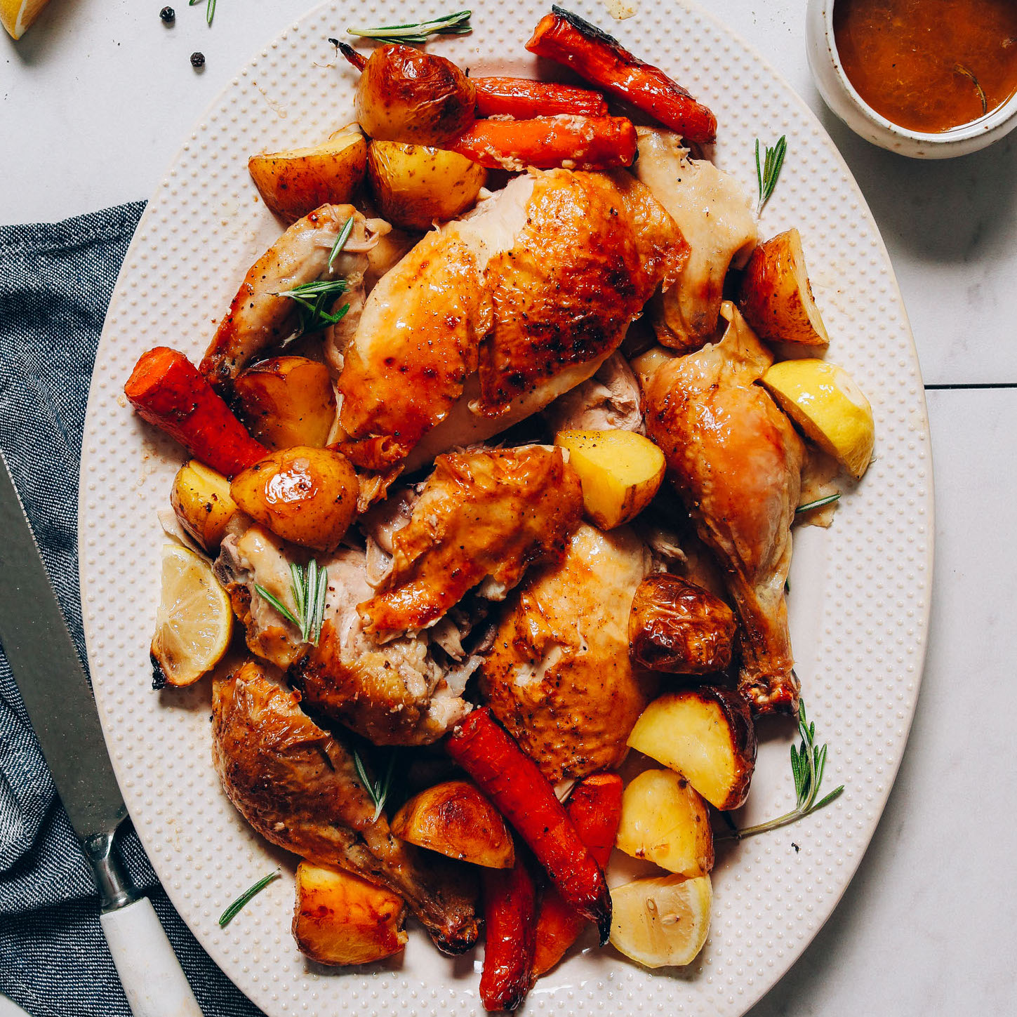 Platter of Oven Roasted Chicken and Roasted Root Vegetables with rosemary