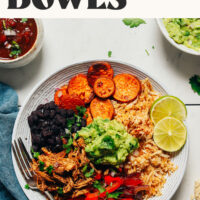 Overhead photo of a grain-free burrito bowl with shredded chicken