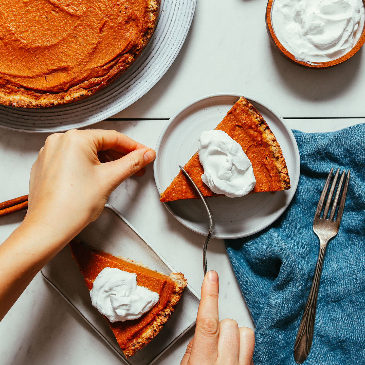 Biting into a slice of our 1-Bowl Pumpkin Pie recipe