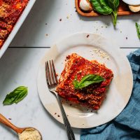 Top view of a slice of Dairy-Free Gluten-Free Lasagna topped with fresh basil