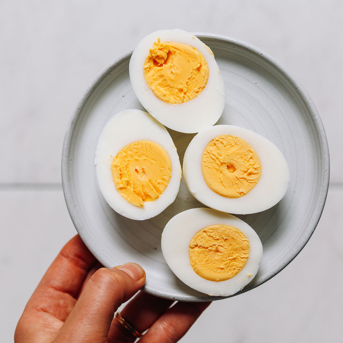 Small plate of perfectly cooked hard boiled eggs