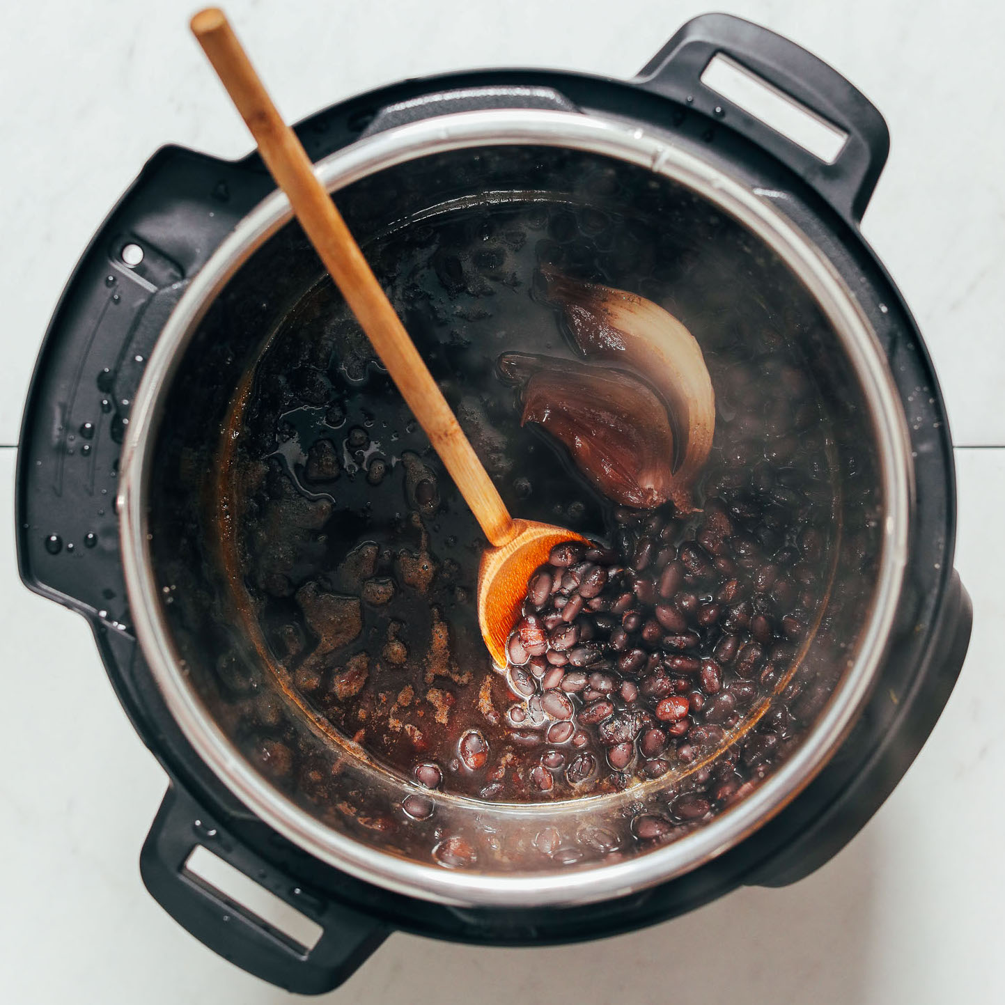Instant Pot of Homemade Black Beans with onion