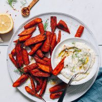 Plat of Moroccan-Spiced Carrots with a bowl of Dairy-Free Yogurt Dip