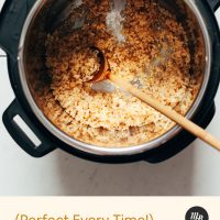 Wooden spoon in freshly cooked Instant Pot Brown Rice