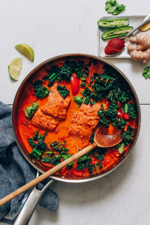 Large pot of Salmon Red Curry made with kale and red bell pepper