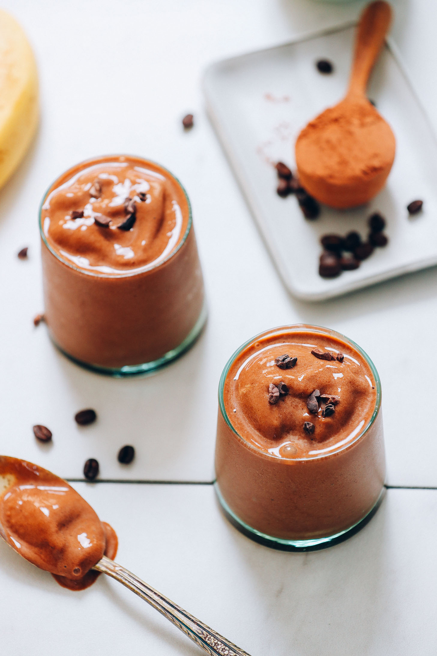 Spoonful and glasses of our Creamy Coffee Smoothie recipe