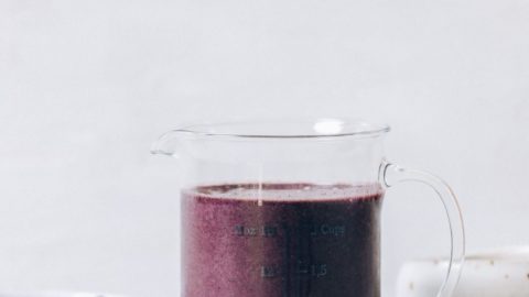 Blueberry Peanut Butter Smoothie in a liquid measuring cup