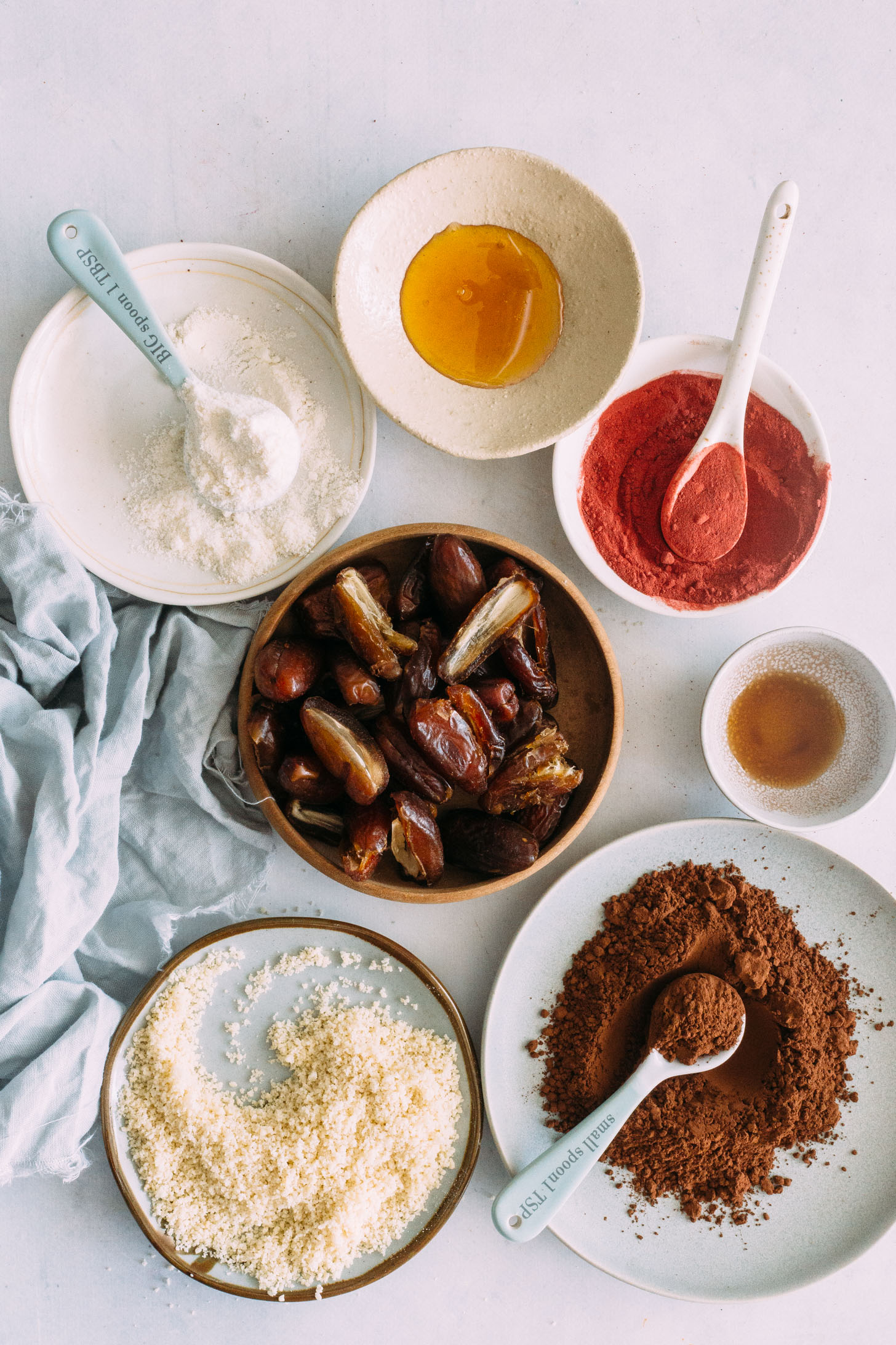 Dates, cacao powder, almond flour, coconut flour, maple syrup, and vanilla