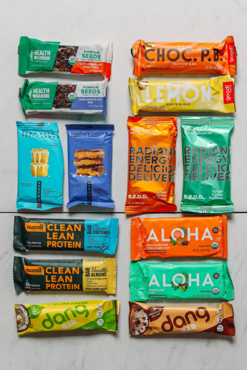 Assortment of plant-based protein bars for our unbiased healthy protein bar review