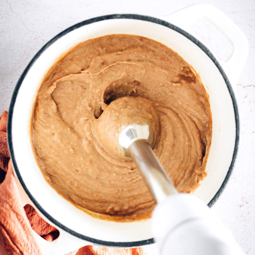 Using an immersion blender to make creamy refried beans