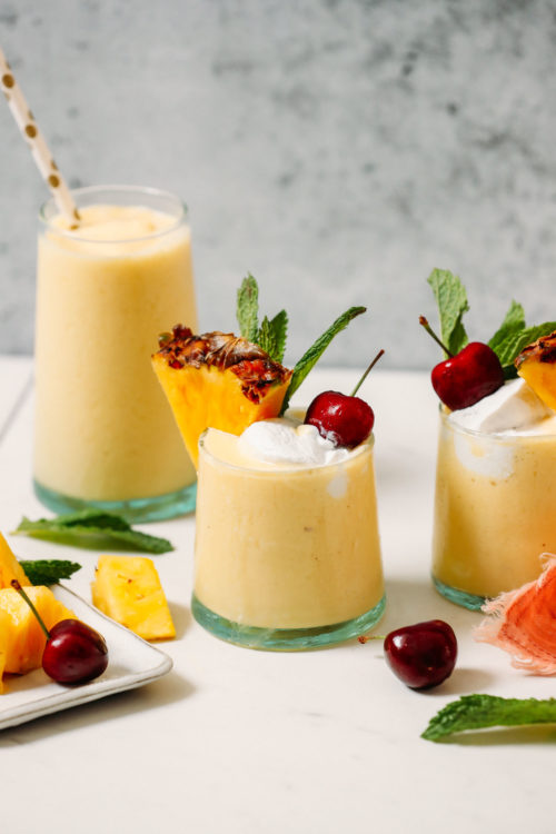 Glasses of a refreshing pina colada smoothie