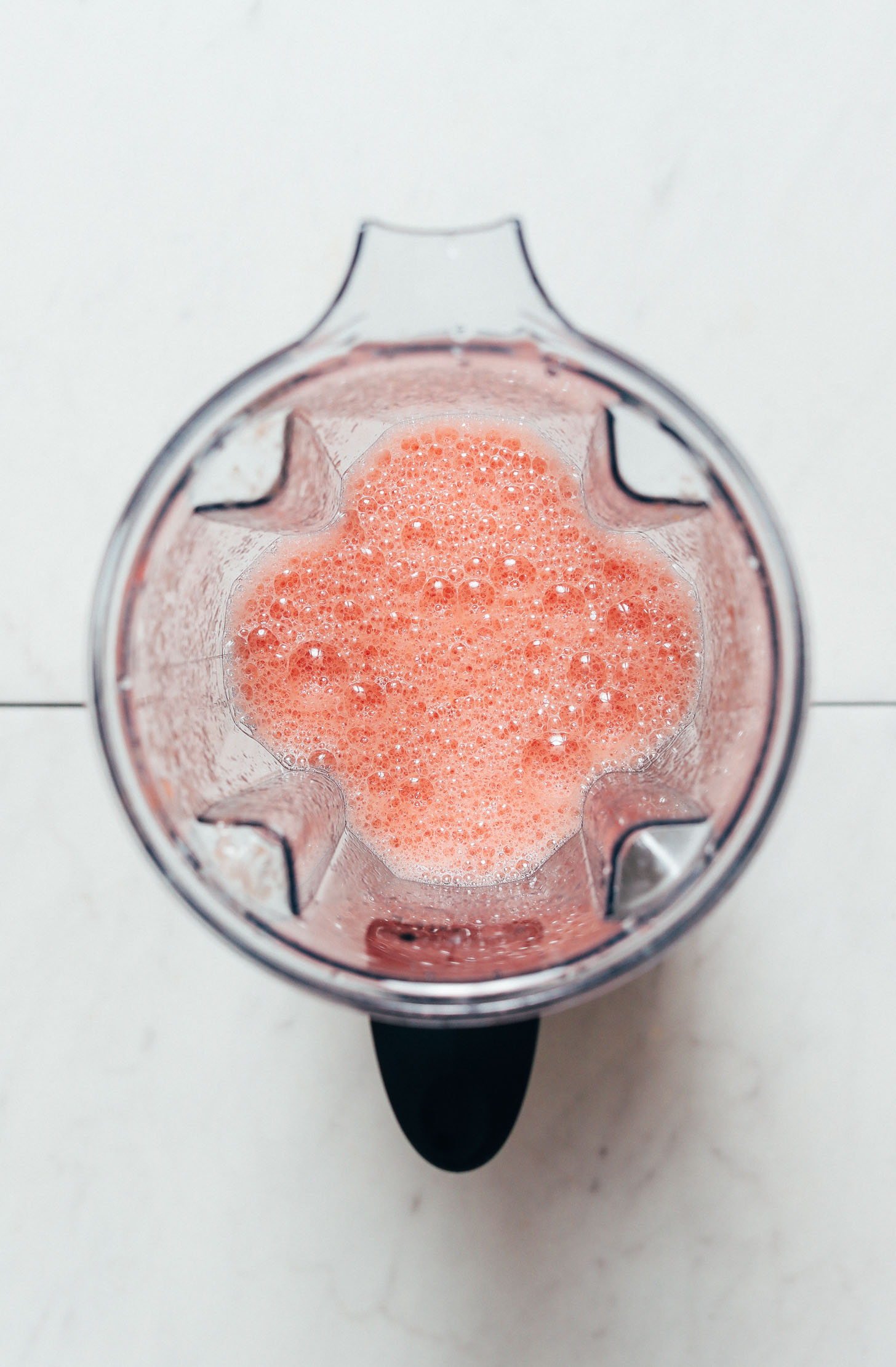 Blender of frothy watermelon juice