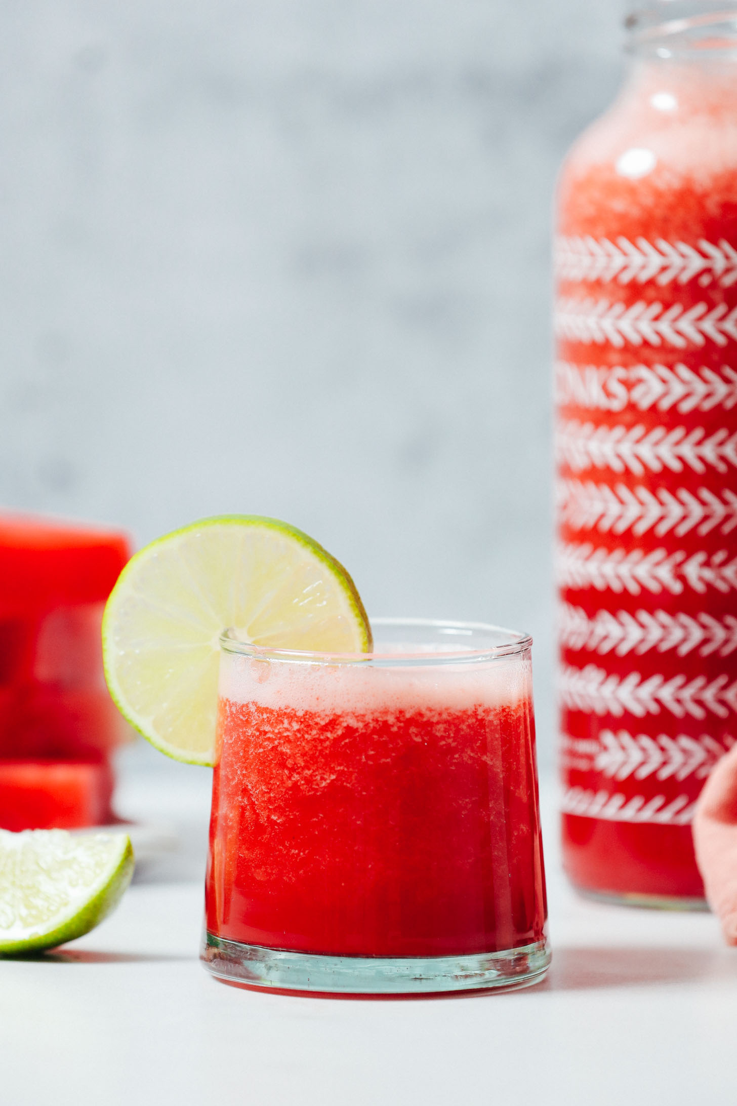 Jar and glass of homemade watermelon juice