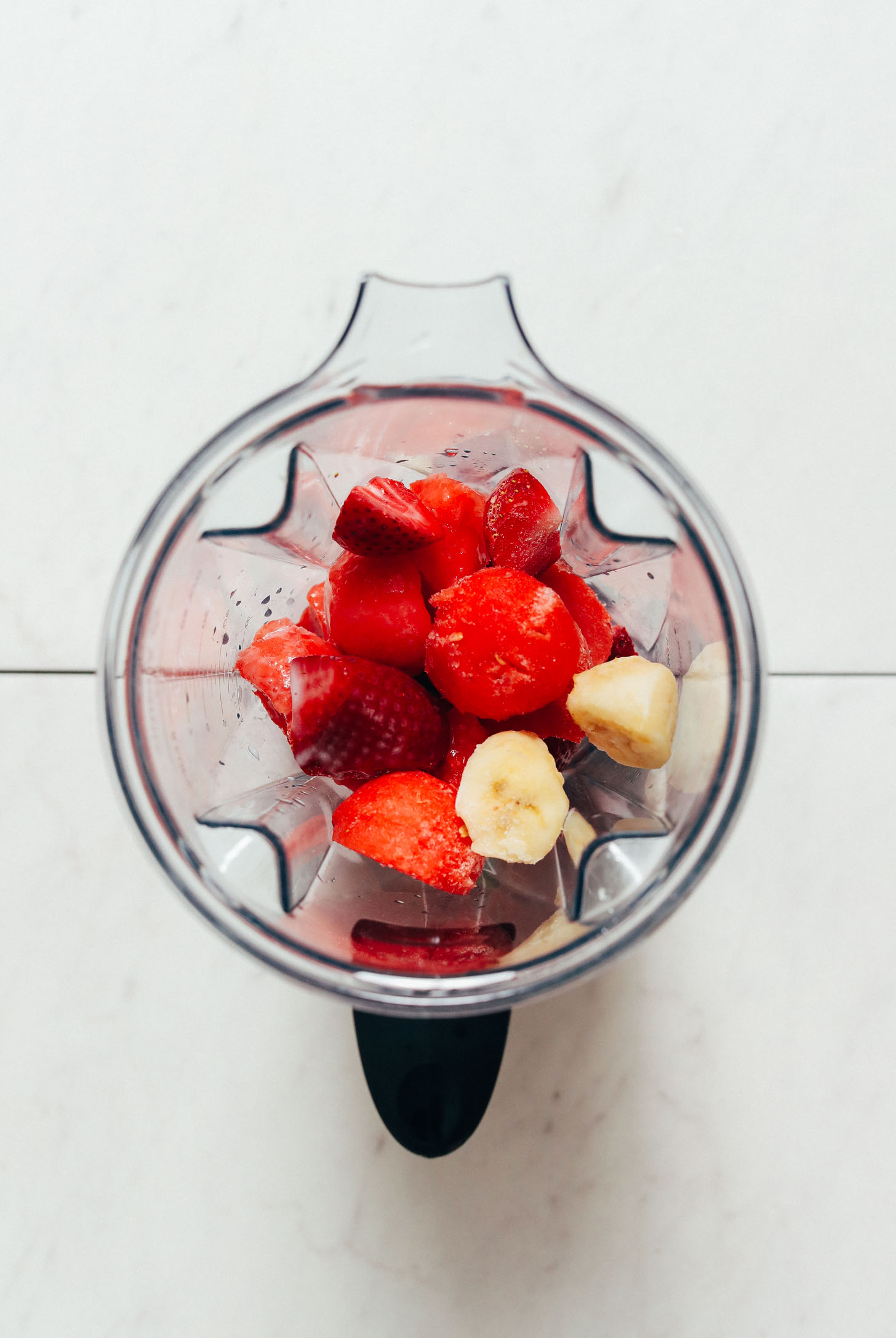 Banana, watermelon, and strawberries in a blender