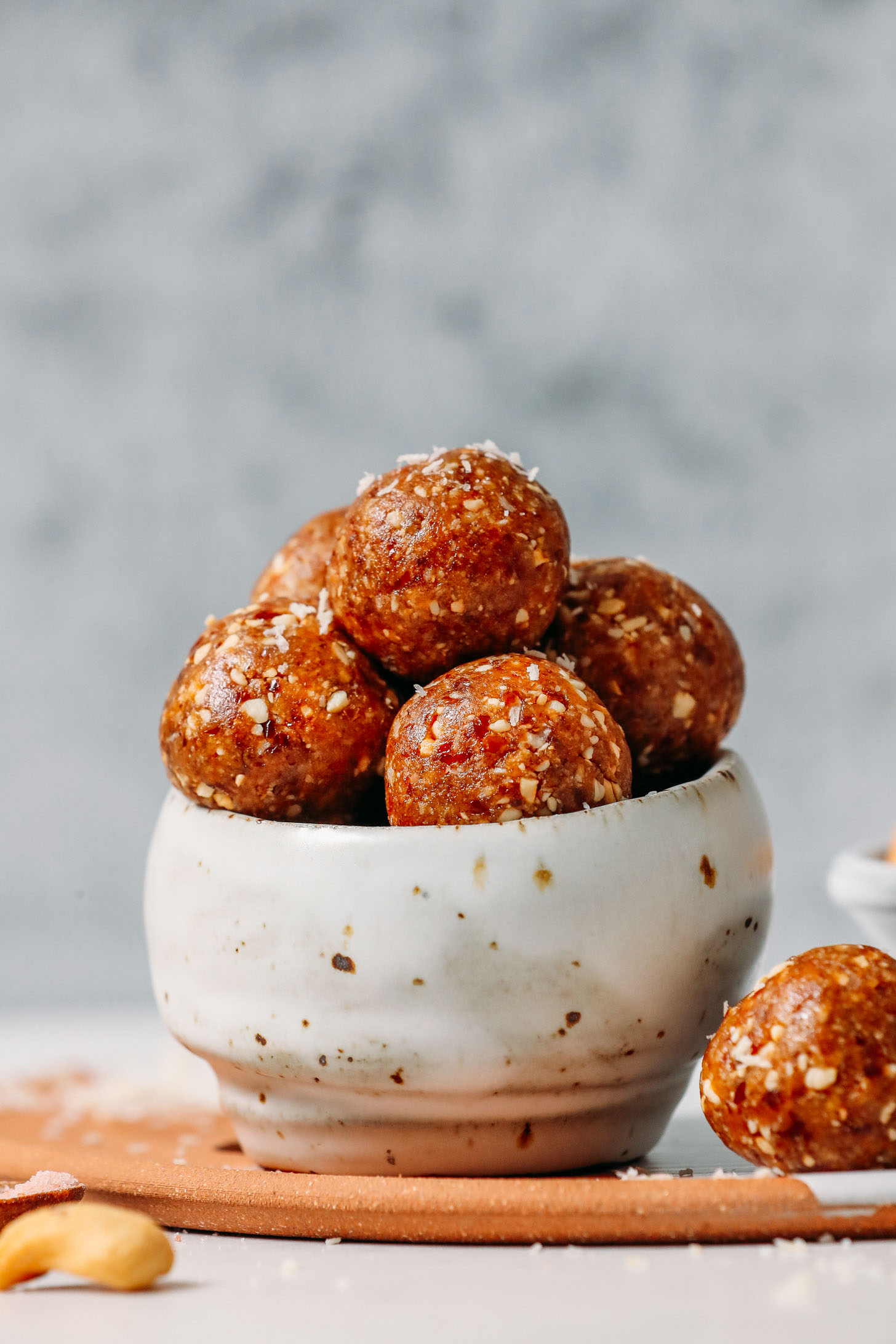 Bowl filled with Cashew Caramel Date Bites