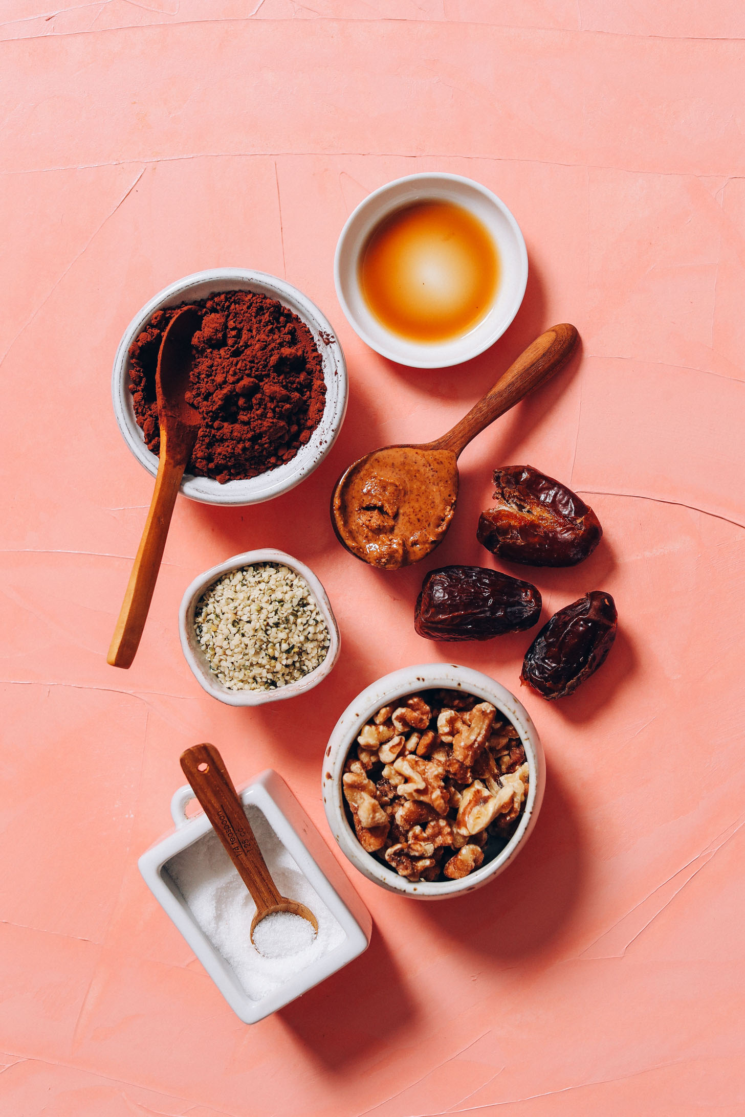 Cacao powder, vanilla, almond butter, dates, walnuts, hemp seeds, and sea salt