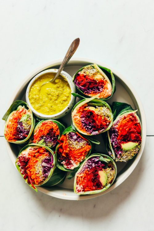 Plate of Collard Green Wraps with Green Curry Tahini Dressing