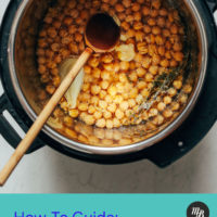 Wooden spoon in a pot of Instant Pot Chickpeas
