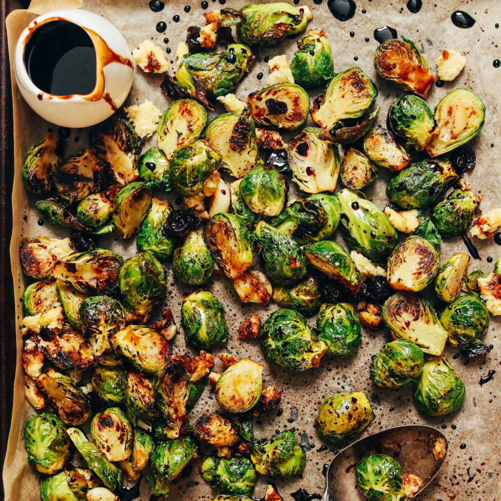 Baking sheet of Crispy Roasted Brussels Sprouts with Balsamic Reduction