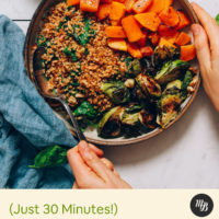 Holding a Butternut Squash Bowl with Brussels Sprouts and Miso