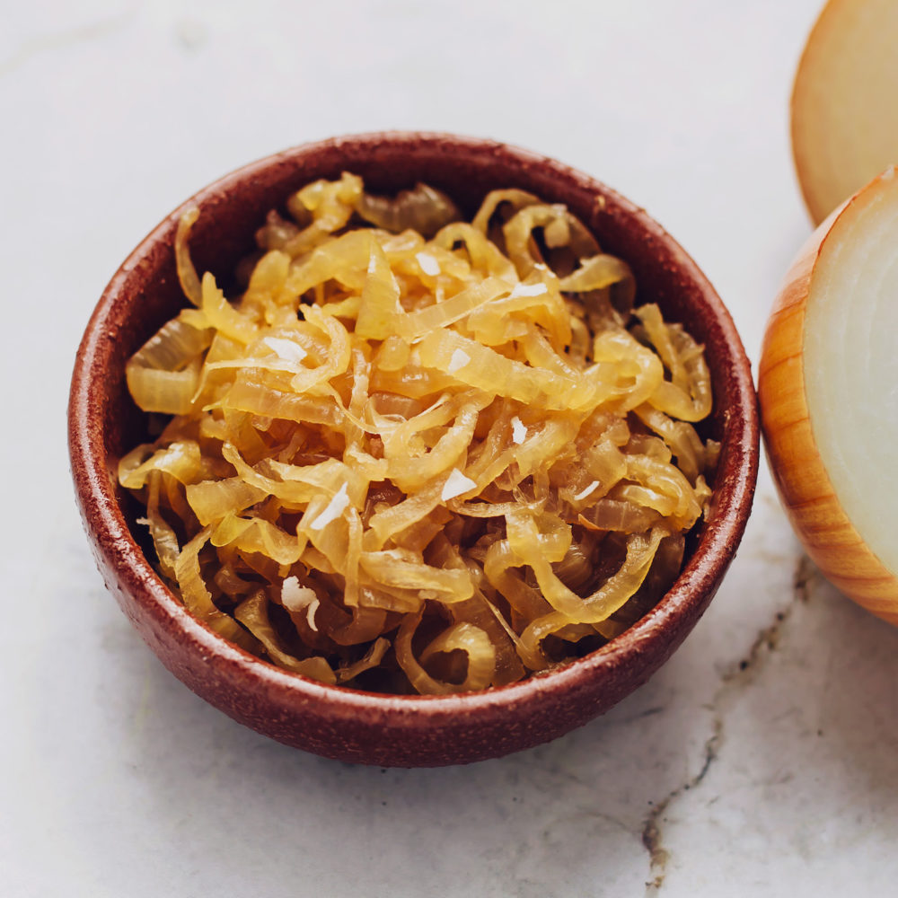 Wooden bowl of oil-free caramelized onions