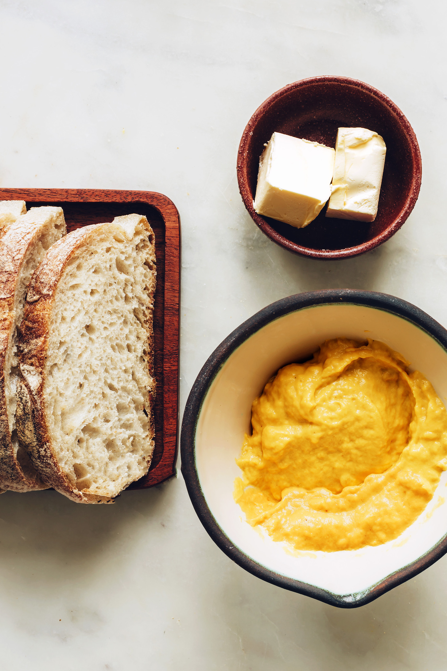 Sourdough bread, vegan butter, and vegan cheddar cheese