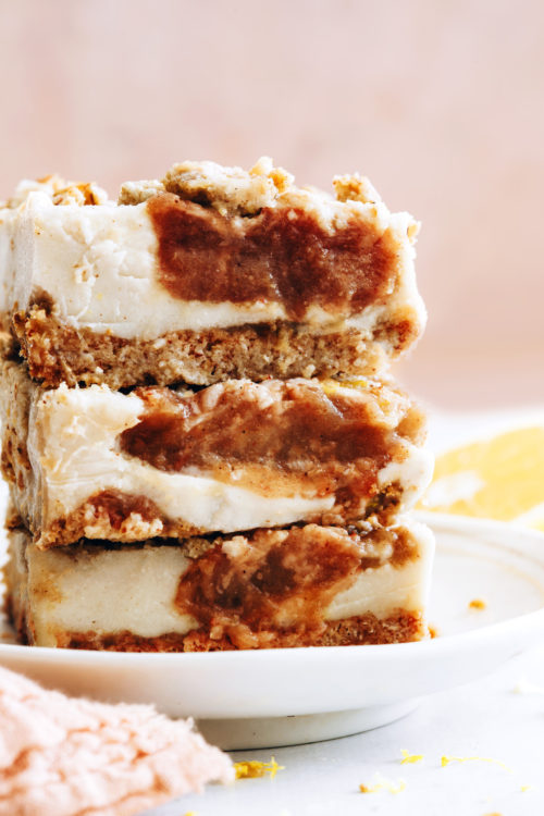 Stack of vegan apple butter cheesecake bars