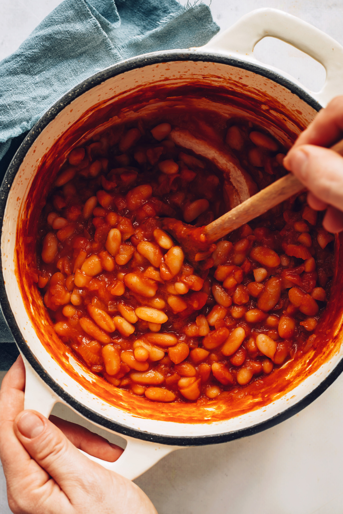 Stirring a pot of baked beans