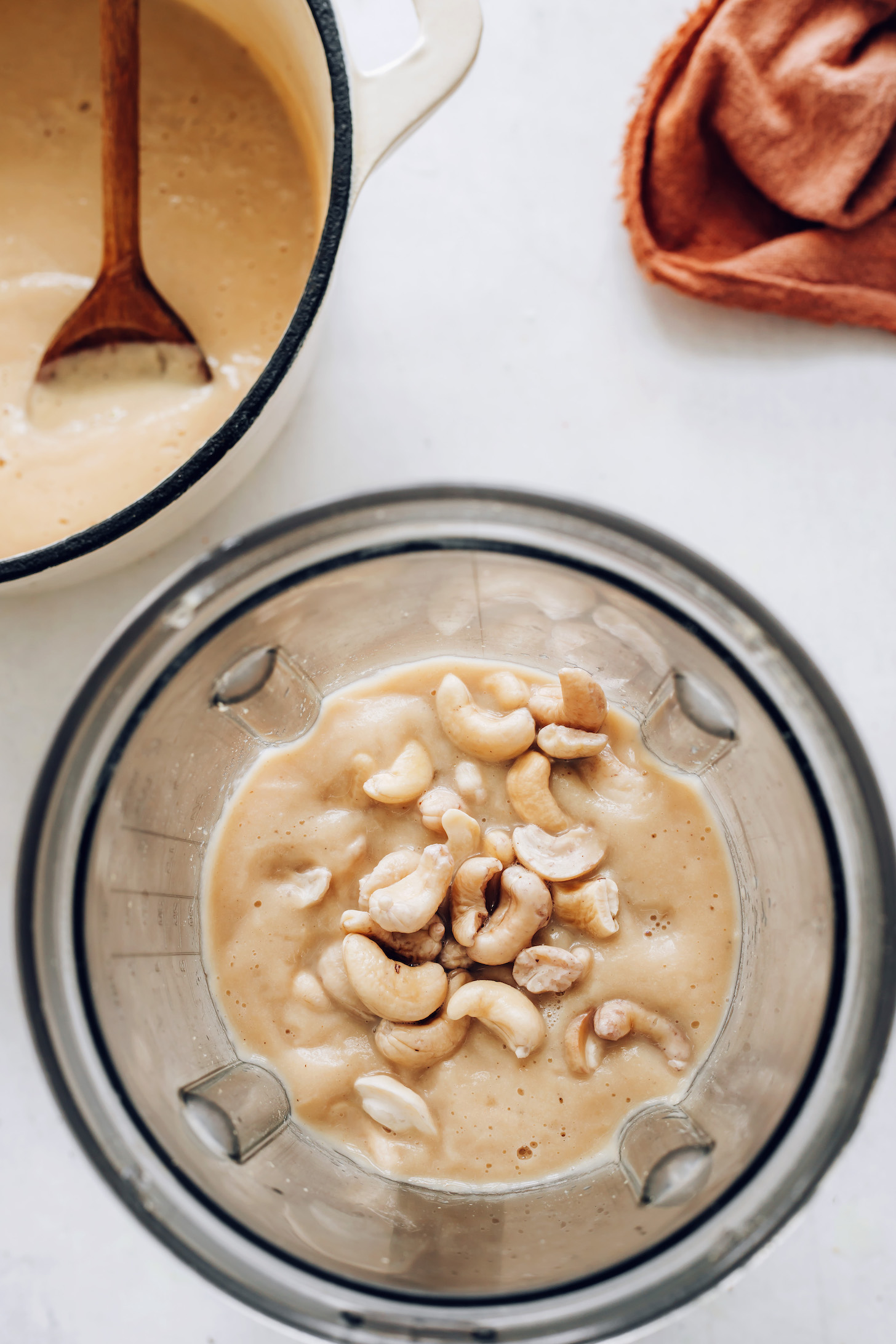 Blender with roasted cauliflower soup and cashews