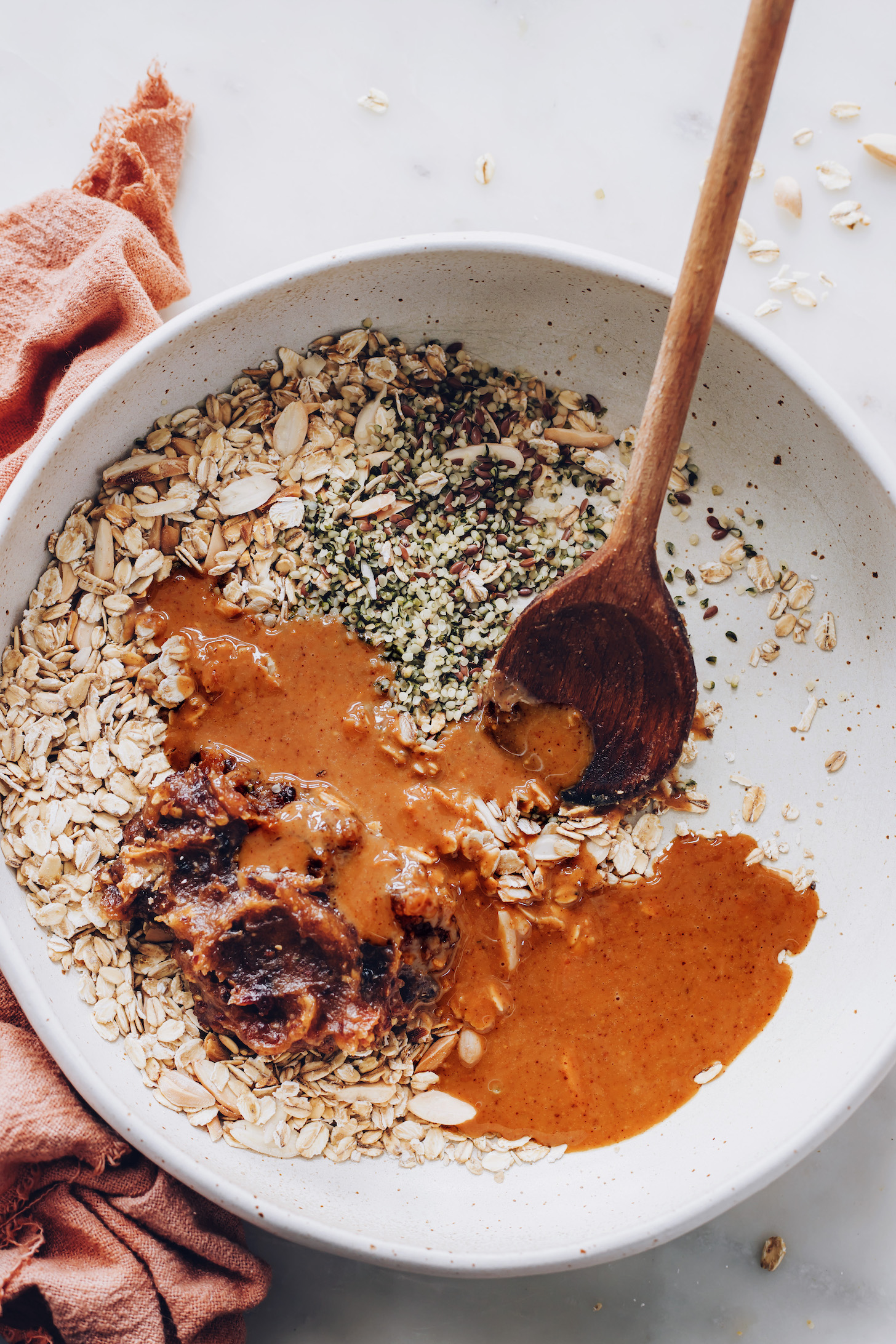 Bowl with dried fruit, nut butter, oats, and seeds