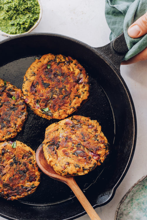 Cooking sweet potato fritters in a cast iron skillet