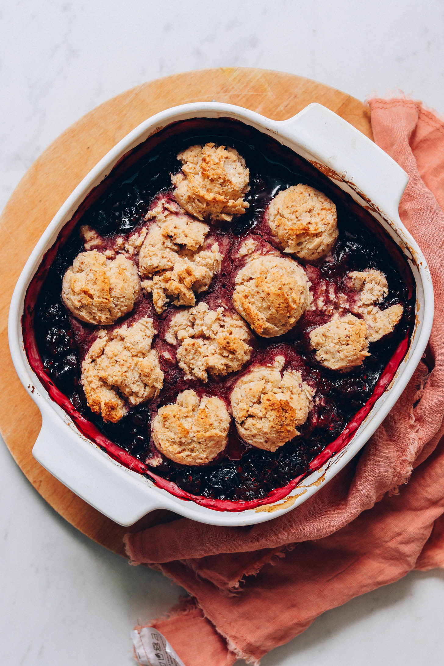 Mixed berry cobbler topped with flaky gluten-free biscuits