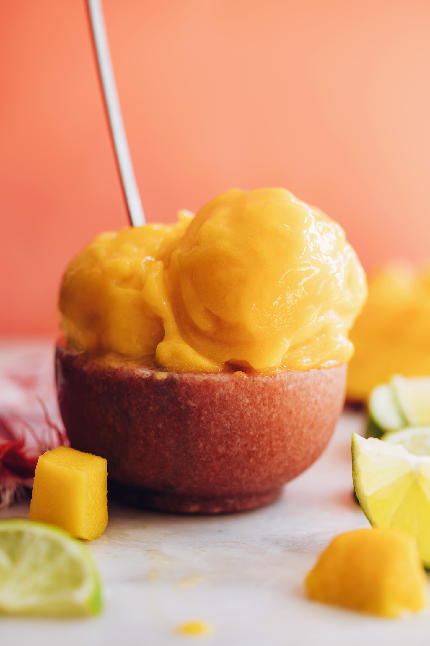 Bowl with scoops of creamy mango sorbet