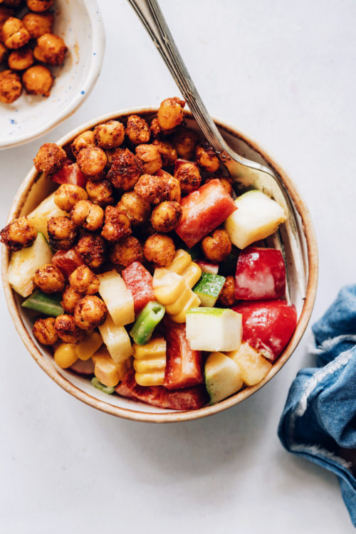 Bowl of our fresh summer salad with BBQ chickpeas