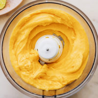 Creamy mango sorbet in a food processor