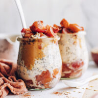 Two jars of apple overnight oats with cinnamon