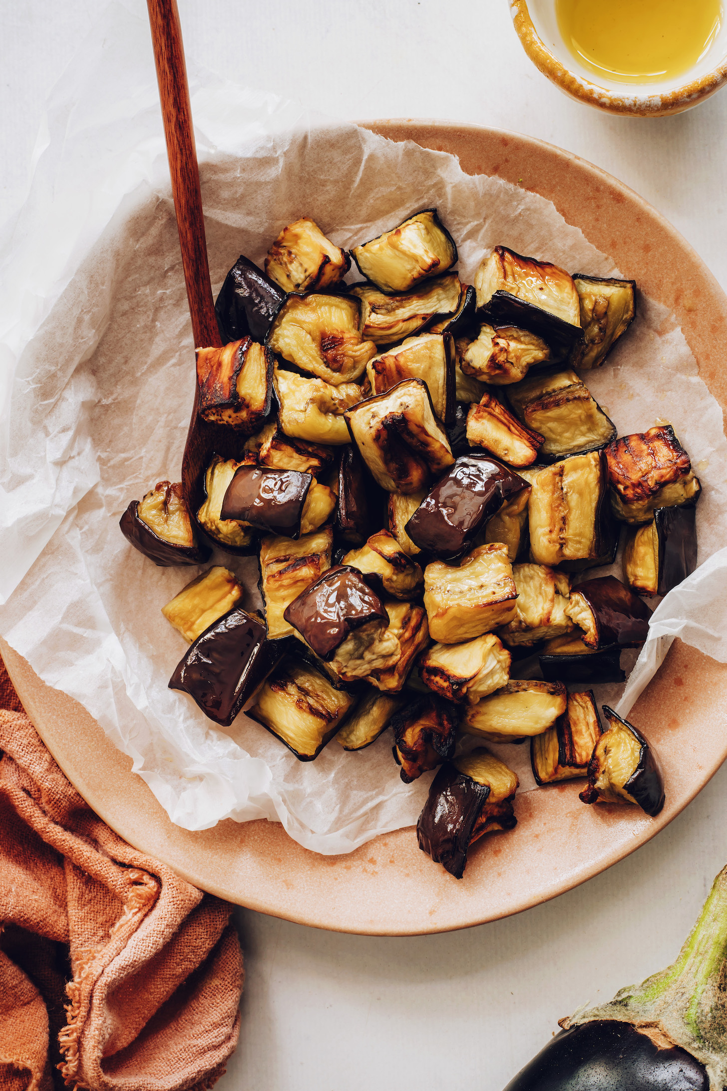 Oven roasted eggplant cubes in a bowl