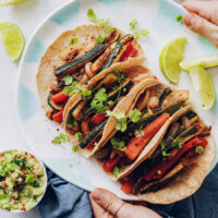 Platter of easy vegan tacos made with zucchini and bell pepper