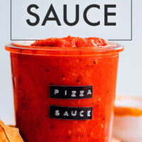 Labeled jar of easy vegan homemade pizza sauce