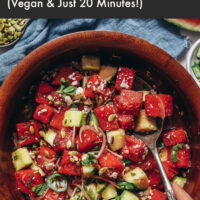 Bowl of vegan minty watermelon cucumber salad with vegan feta cheese