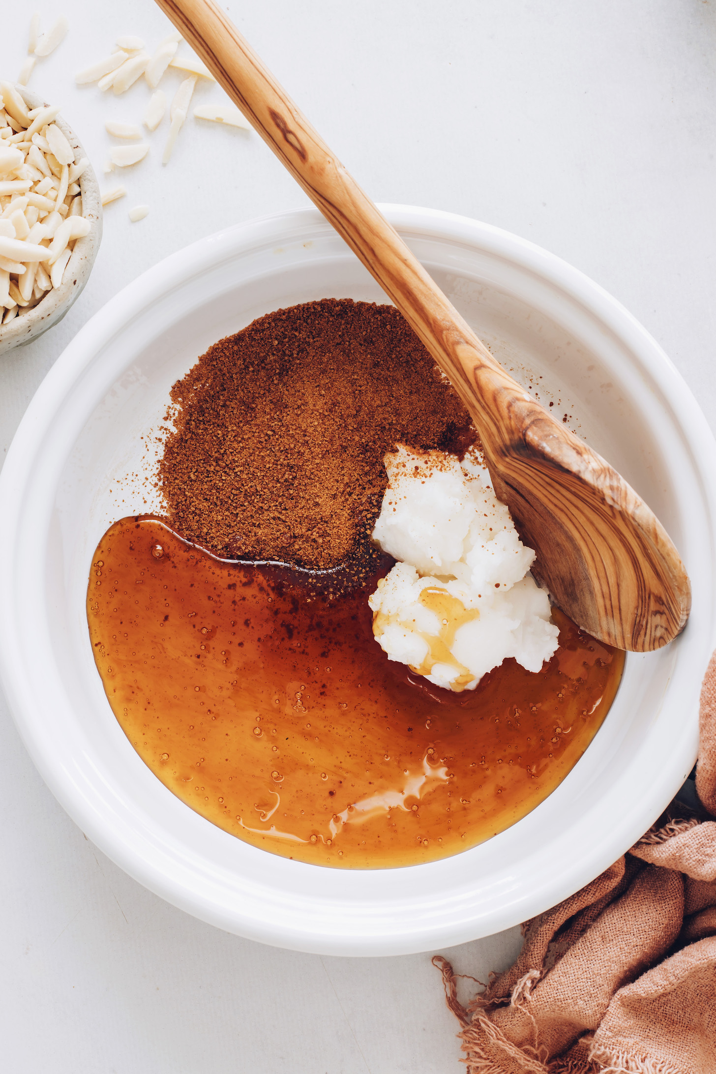 Coconut oil, coconut sugar, and maple syrup in a saucepan